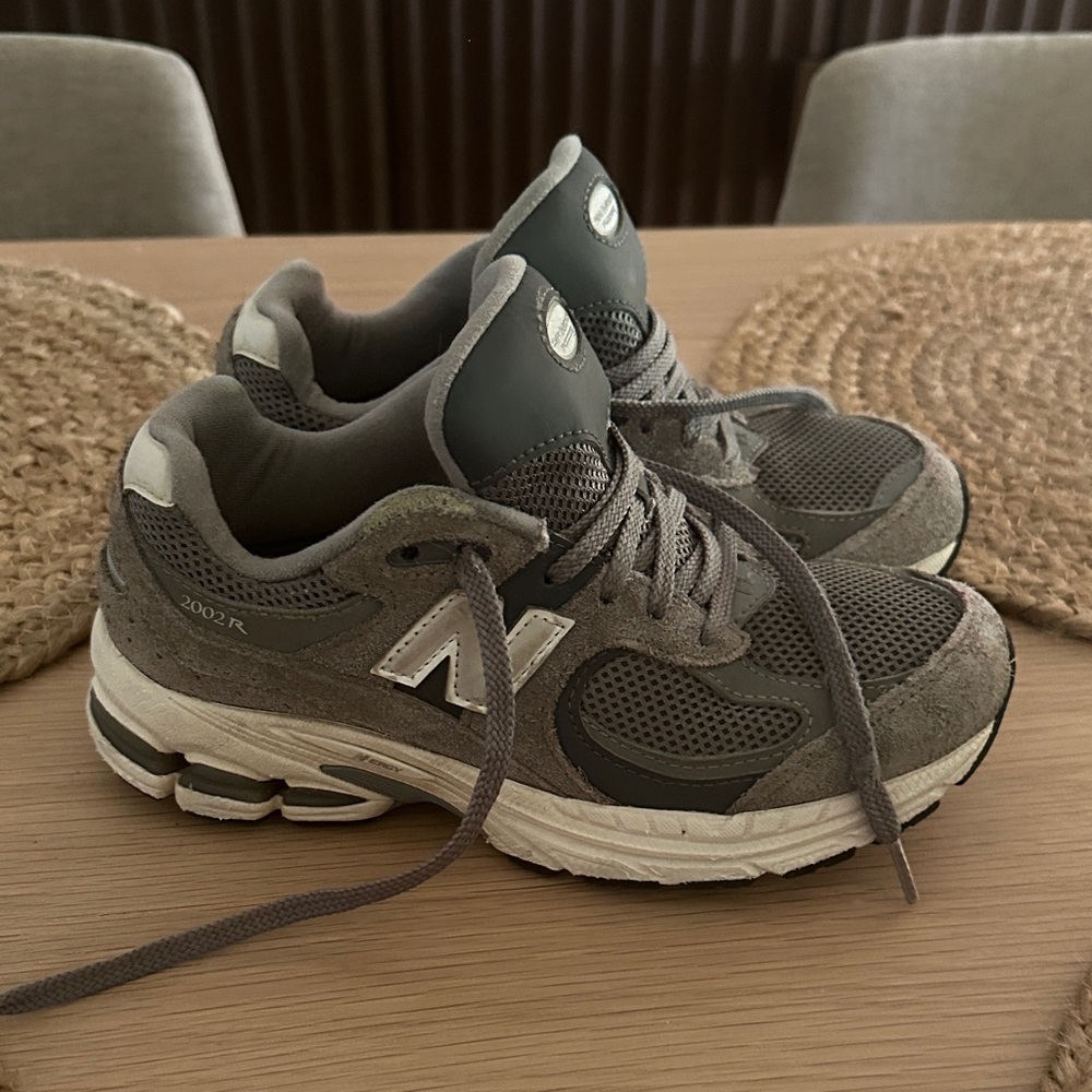 New Balance boy's Charcoal and White Sneakers